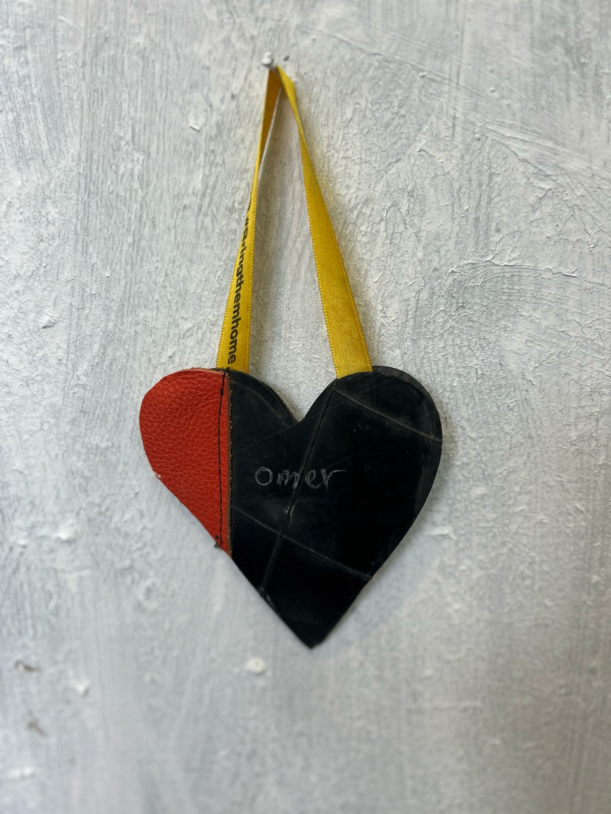 Key chain heart for BRING THEM HOME made from inner tubes (RED STRIP)